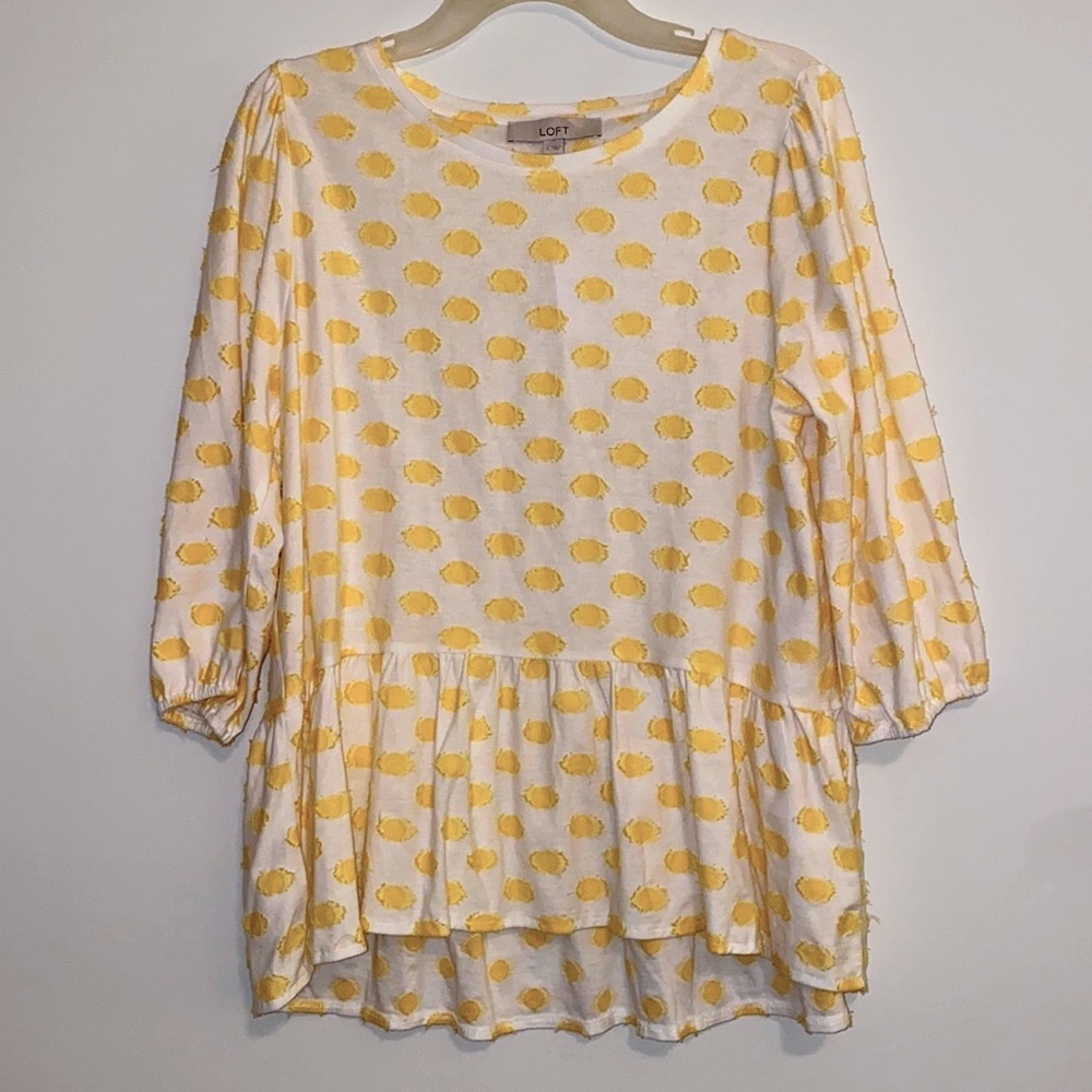 Polka dot peplum top